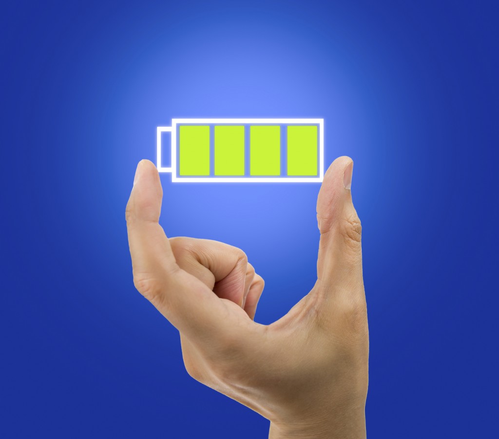 Hand showing a battery full icon .All screen content is designed by my and not copyrighted by others and created with digitizing tablet and image editor